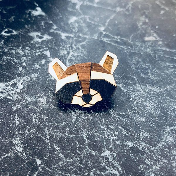The wooden raccoon brooch