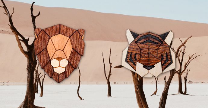 The tiger and lion wood brooch in the landscape of Africa