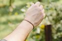 Knitted bracelet Brown